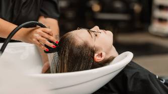 innovative stylist page, creative, showcasing a mood board, photorealistic, a clatter of artistic tools in a bustling creative workspace, highly detailed, swirling colors and textures, vibrant primary colors, ambient daylight glow, shot with a 40mm lens.