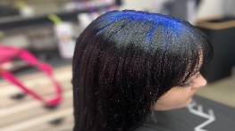 elegant stylist entrance, graceful, queuing up attendees, photorealistic, a luxurious hotel ballroom with intricate decor, highly detailed, clatter of heels on marble floor, opulent ruby reds and gold, chandeliers casting glows, shot with a 50mm lens.